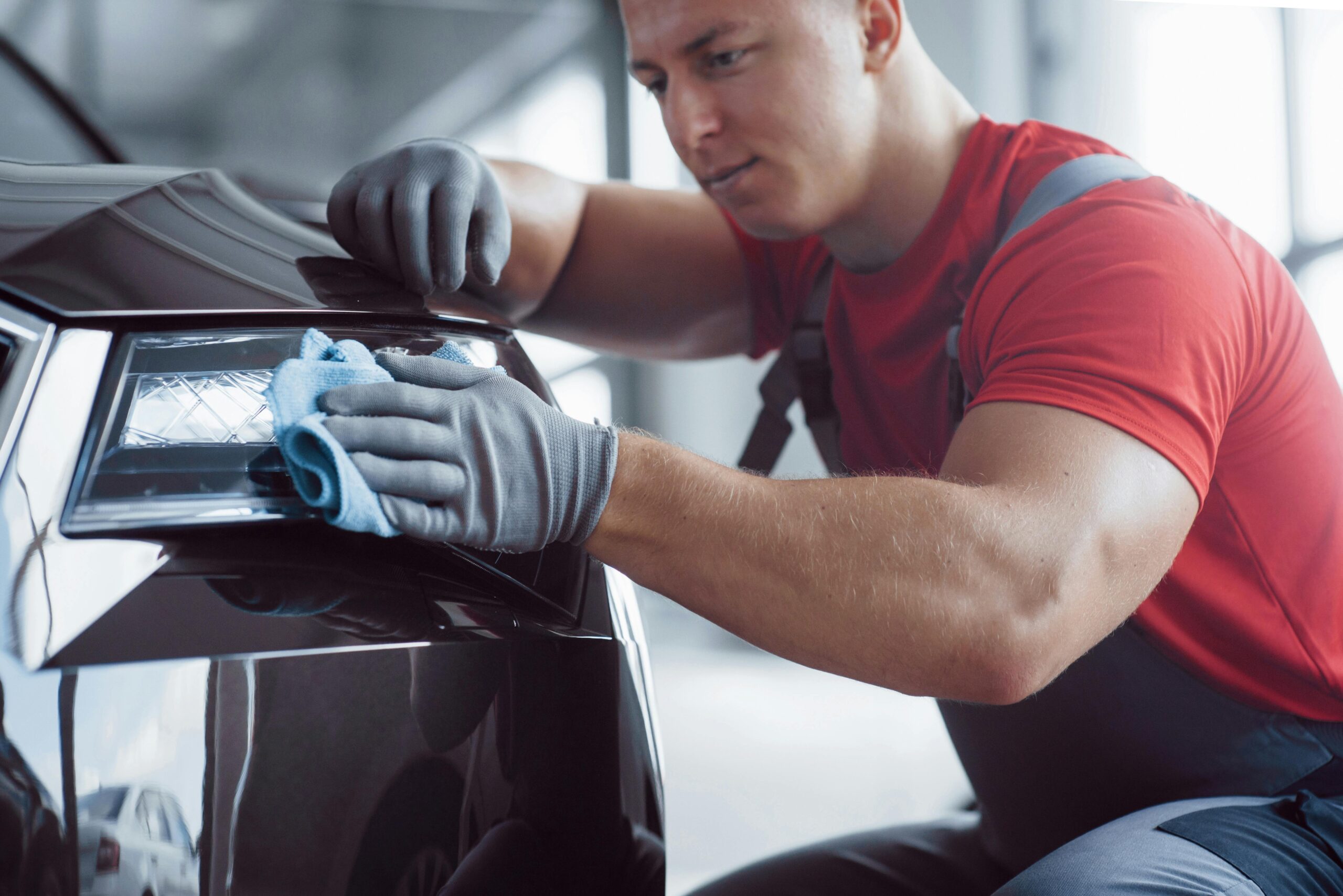 San Diego mobile car detailing crew polishing a luxury vehicle
